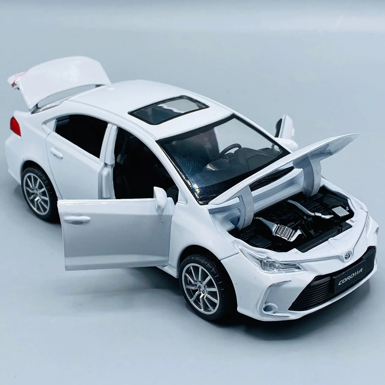Corolla Toy Car with Smart Sensor Touch High-Quality Kids Toy Vehicle (Random Colors Available)
