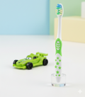 DORCO Children? Soft Toothbrush with Fun Toy & Protective Case �Gentle Care for Kids�Teeth & Gums (Random Design)