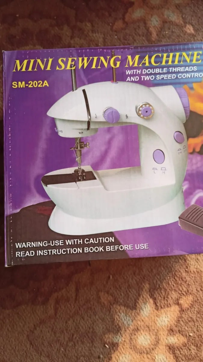 SM-202A Electric Mini Sewing Machine �Double Threads & Two Speed Control for Home & Travel