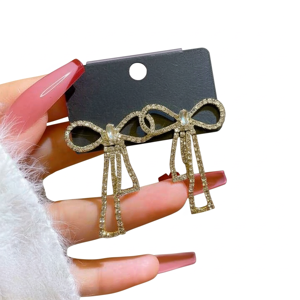 PQT-985 Touch Of Glamour To Your Look With These Bow Shape Zircon Korean Earrings �Color Golden