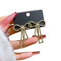 PQT-985 Touch Of Glamour To Your Look With These Bow Shape Zircon Korean Earrings �Color Golden