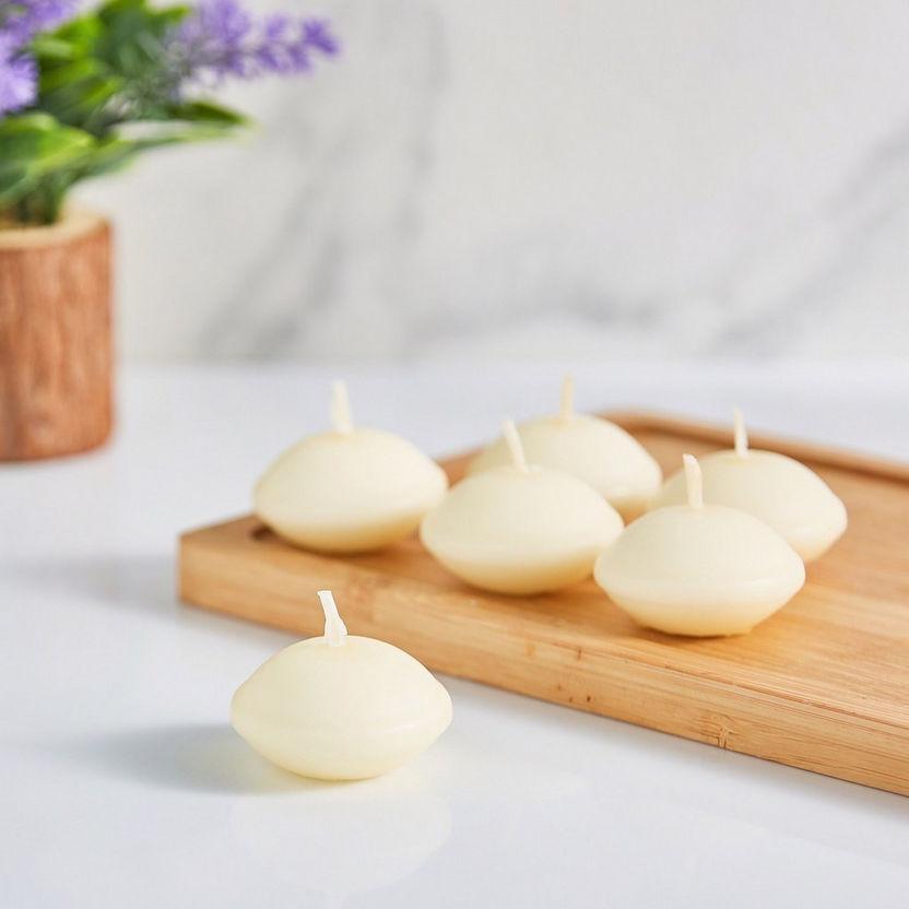 Floating candles .. pack of 12
