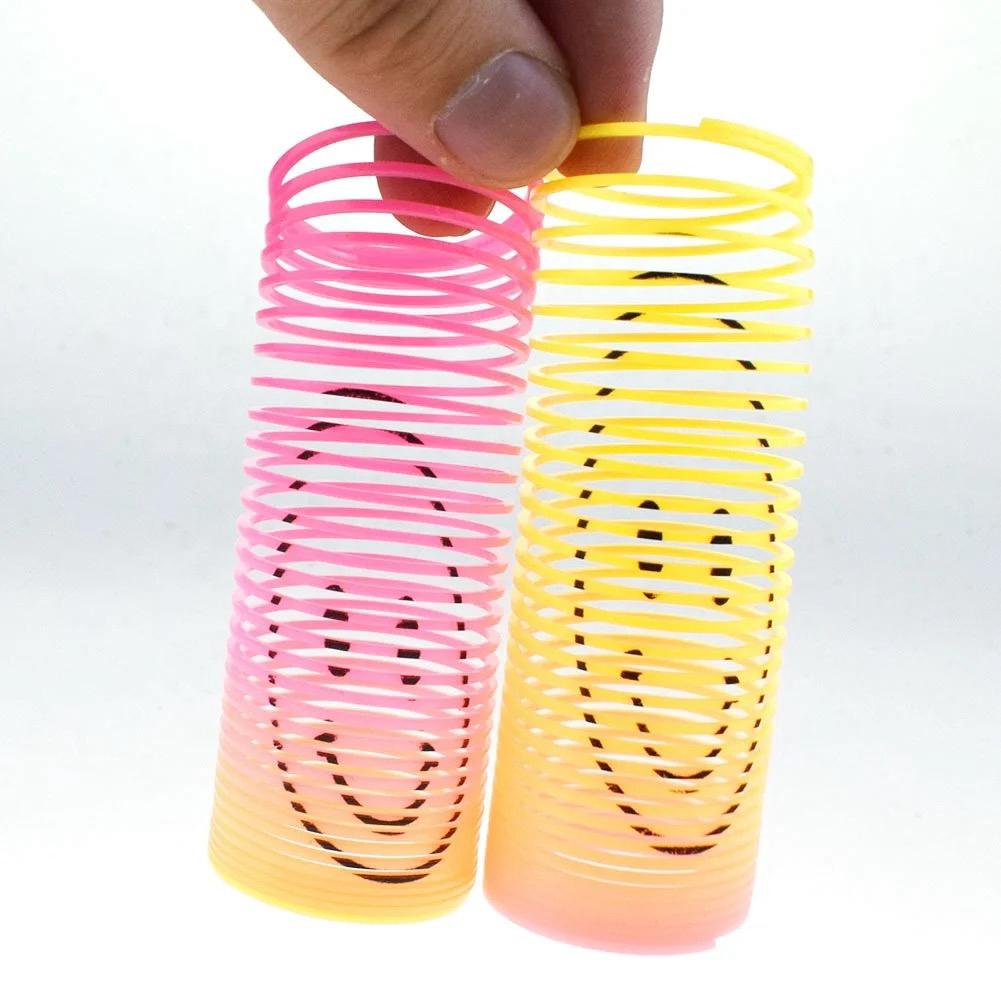 12Pcs Rainbow Smile Magic Springs Circle Toys for Children Birthday Party Favors Giveaway Gifts