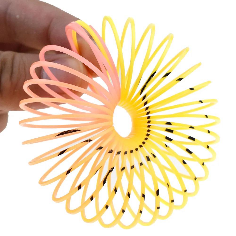 12Pcs Rainbow Smile Magic Springs Circle Toys for Children Birthday Party Favors Giveaway Gifts