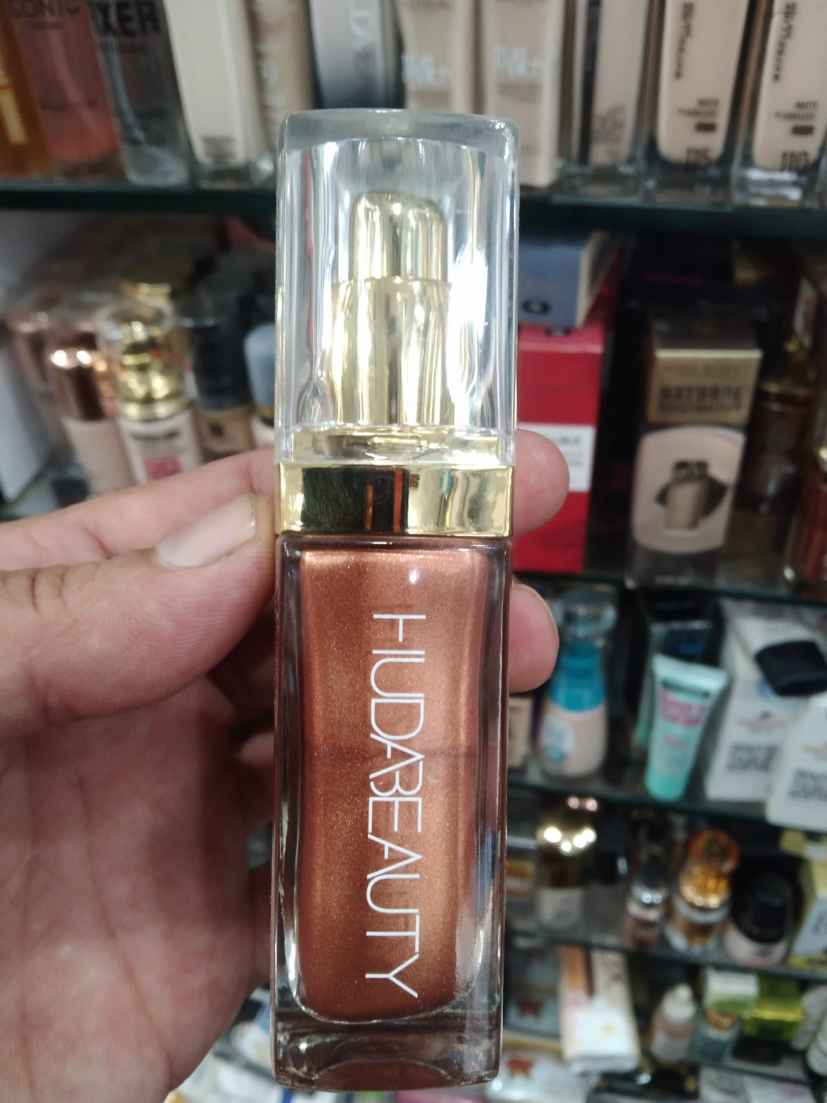 Huda Beauty N.Y.M.P.H. All Over Body Highlighter �Liquid Illuminator for Face, Body &amp; Legs �Water-Based, Long-Lasting Glow �35 ml