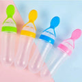 Silicone Baby Spoon Squeezing Feeding Bottle Feeder �Soft, Safe &amp; Easy Baby Food Dispenser (Random color)