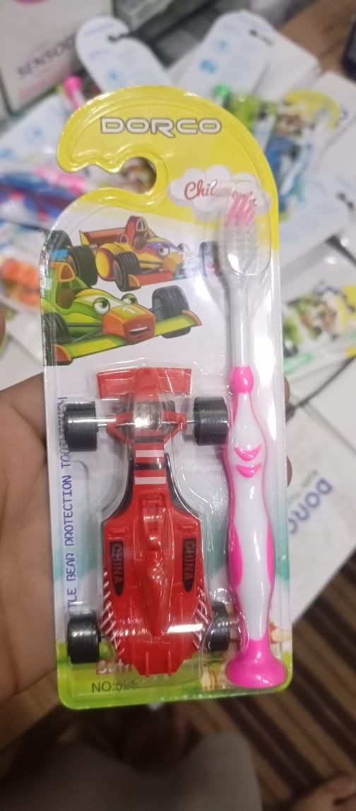 DORCO Children? Soft Toothbrush with Fun Toy & Protective Case �Gentle Care for Kids�Teeth & Gums (Random Design)