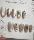 Pack of 12 - Cat Eye Nails Luminous Magnetic Effect Soft Nude Champagne Gold Almond Nails With Shimmer Polka Dots And Fine Bow Line Art (Random Design)
