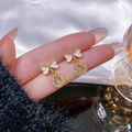 PXT-988 Smiley Face Zircon Korean Earrings �Elegant Bow &amp; Crystal Circle Design - Available In Goden And Silver Color - Golden
