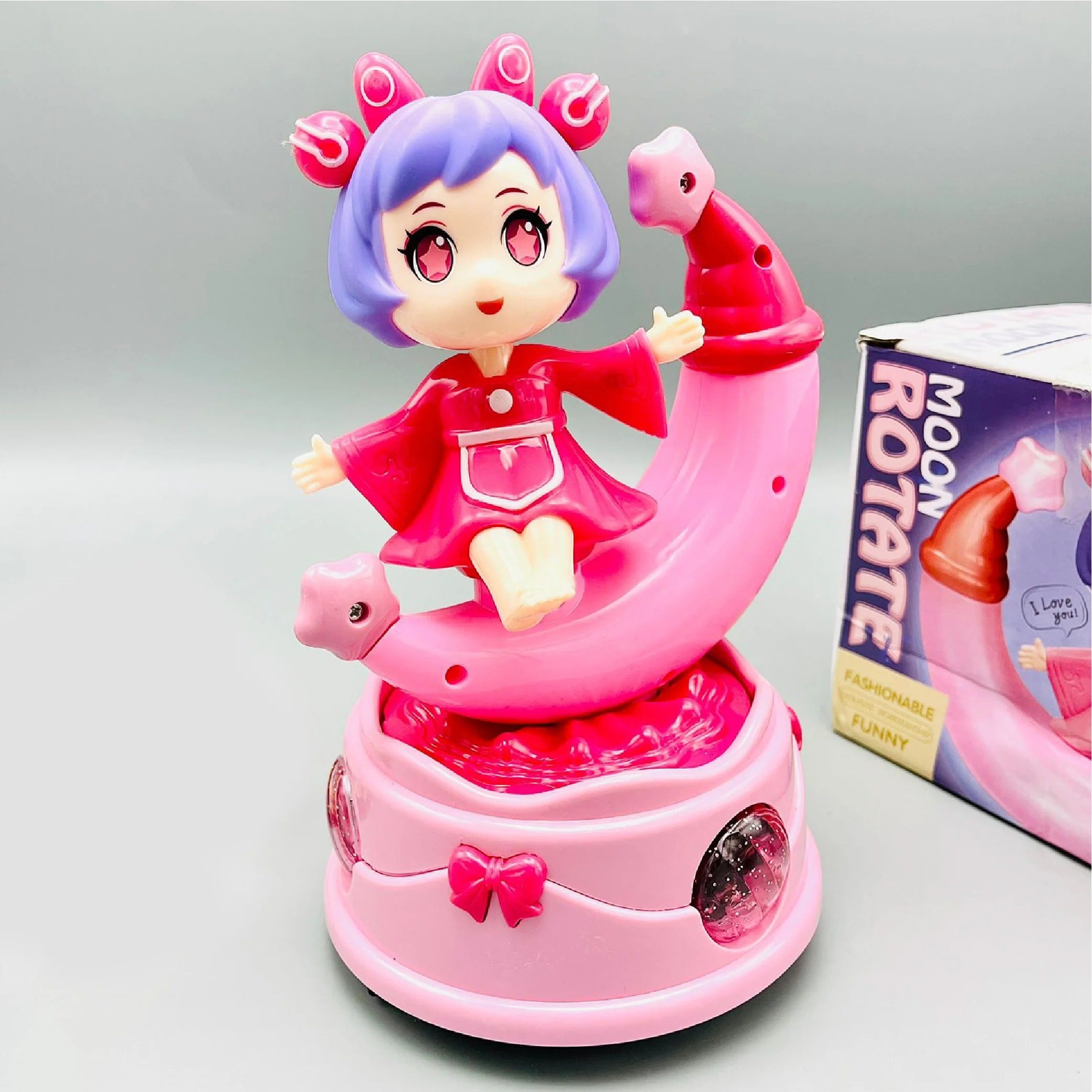 Rotating Moon Doll Toy With LED Lights &amp; Music �Adorable Crescent Moon Design, Universal Rotation, Safe for Kids 3+, Pink &amp; Purple Gift for Fun and Sensory Play (Random Color)